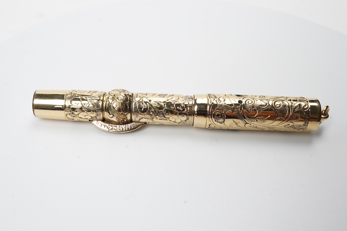 A Conklin ring top hand engraved crescent filler fountain pen with 14ct. gold Conklin flexible nib